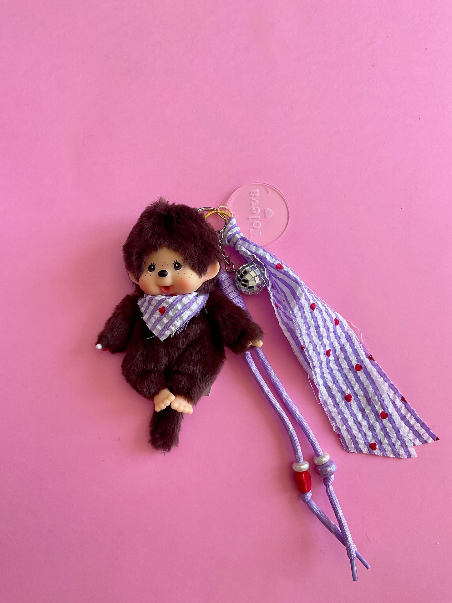 Monchhichi rayé violet