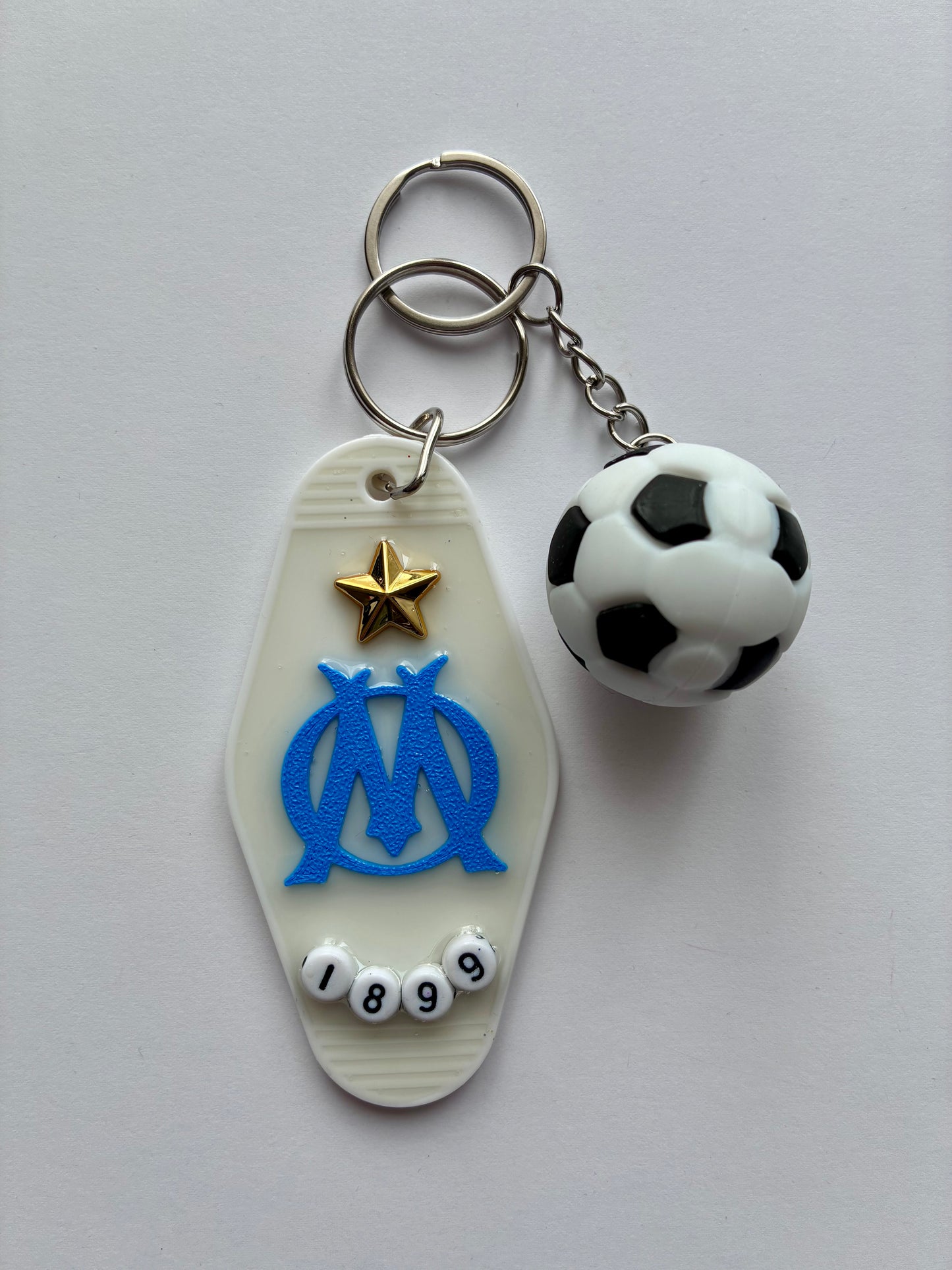 Porte clé OM 🔵⚪️
